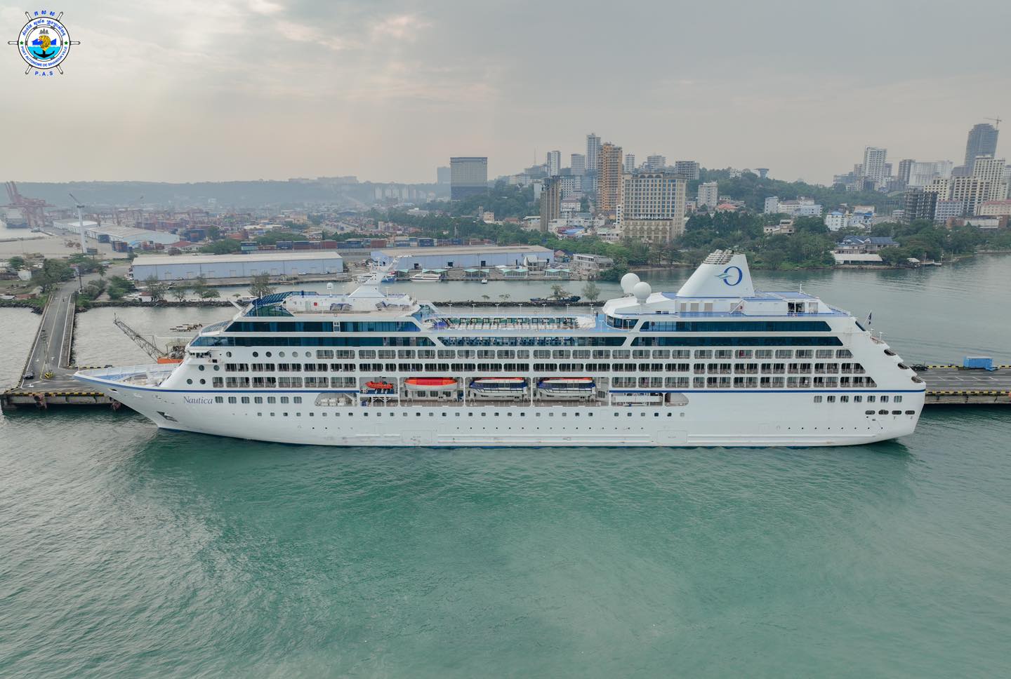 Cruise ship Nautica with Marshall Island nationality, length of 180.45 meters, width of 30.27 meters, and depth of -6.20 meters, docked safely at PAS after leaving Thailand, to visit Cambodia for one day
